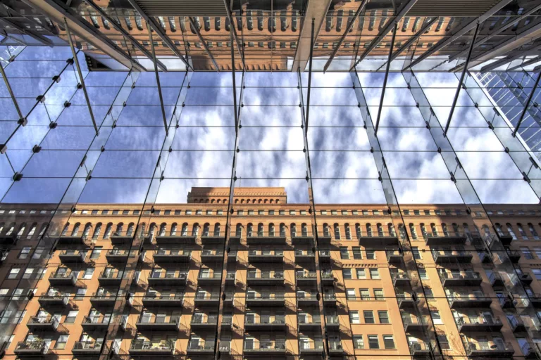 Looking up and through the glass wall in the lobby of 150 North Riverside.