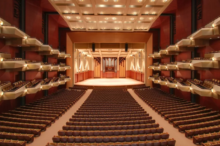 Interior view of Benaroya Hall's main hall, floor seating, balconies, and central stage