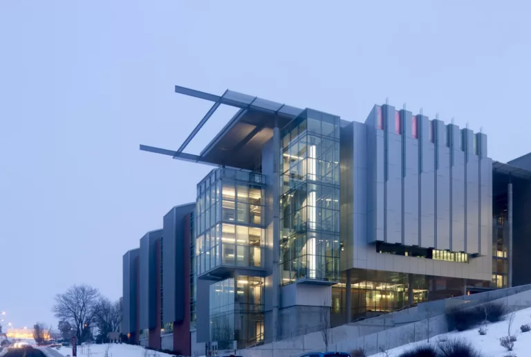 Exterior twilight view of the four-story WSU Veterinary Medical Research Building