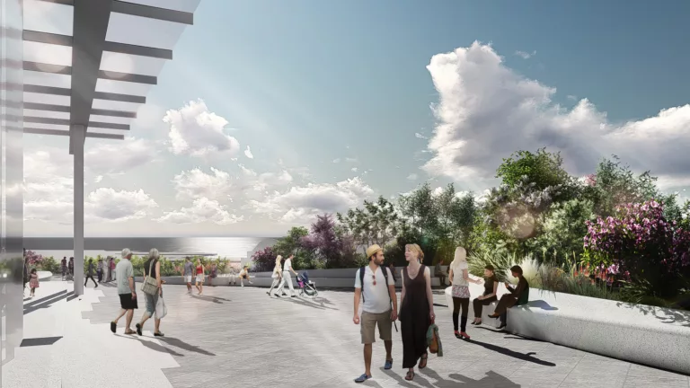 Daylight rendering of the landscaped Overlook Walk with visitors surrounded by landscaping and offering a distant view of Elliott Bay