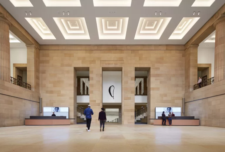 Philadelphia Museum of Art Expansion's Lenfest Hall interior with visitors and information desks