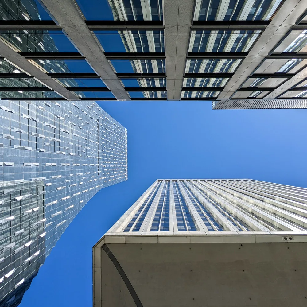 Looking up at Rainier Tower, home to MKA's headquarters, with Rainier Square in the background